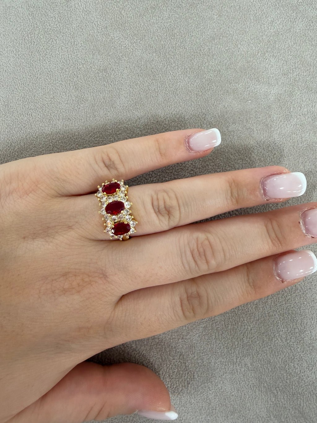 Anello Trilogy in Acciaio Gold  con Zirconi Rubino