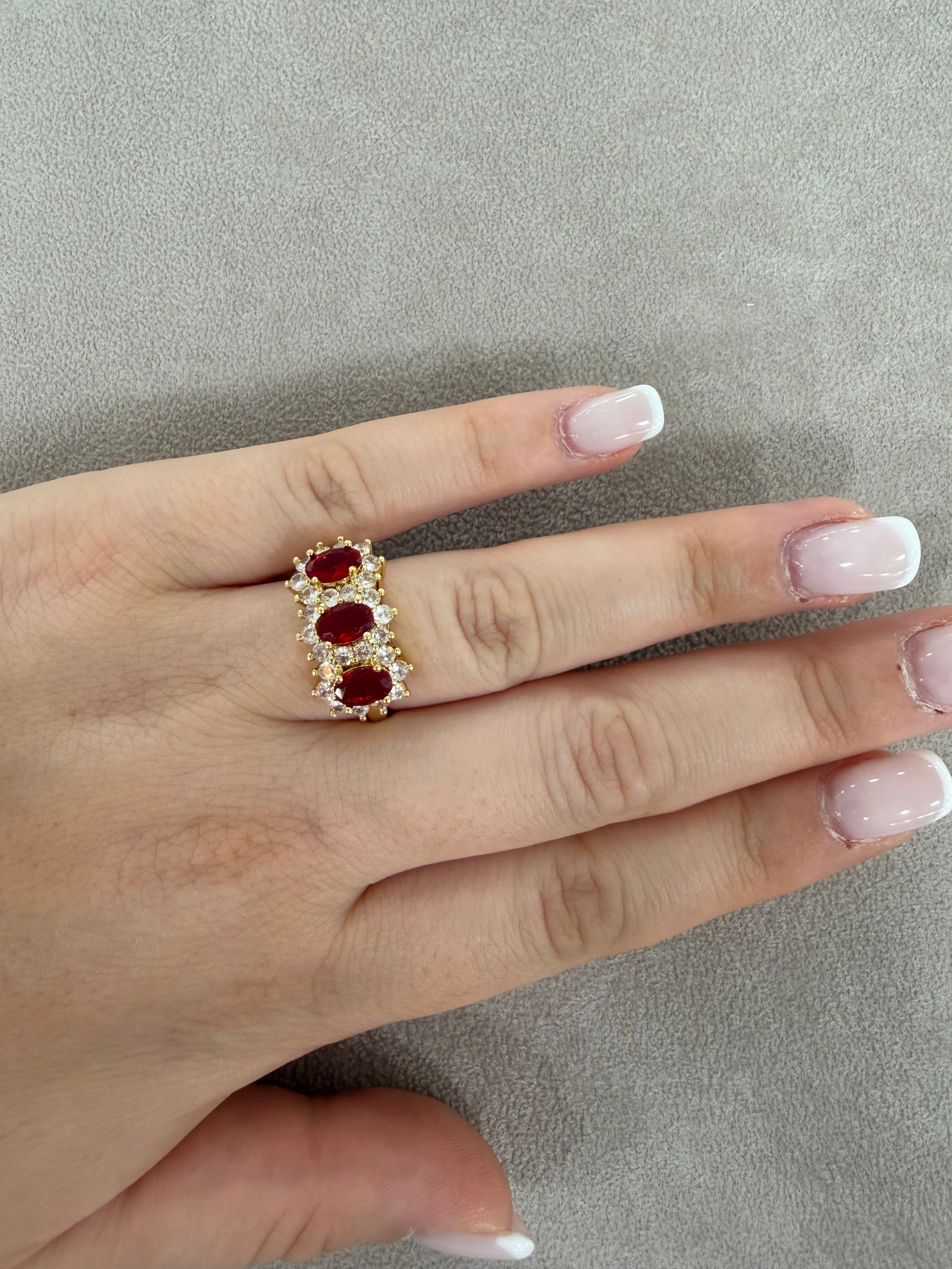 Anello Trilogy in Acciaio Gold  con Zirconi Rubino