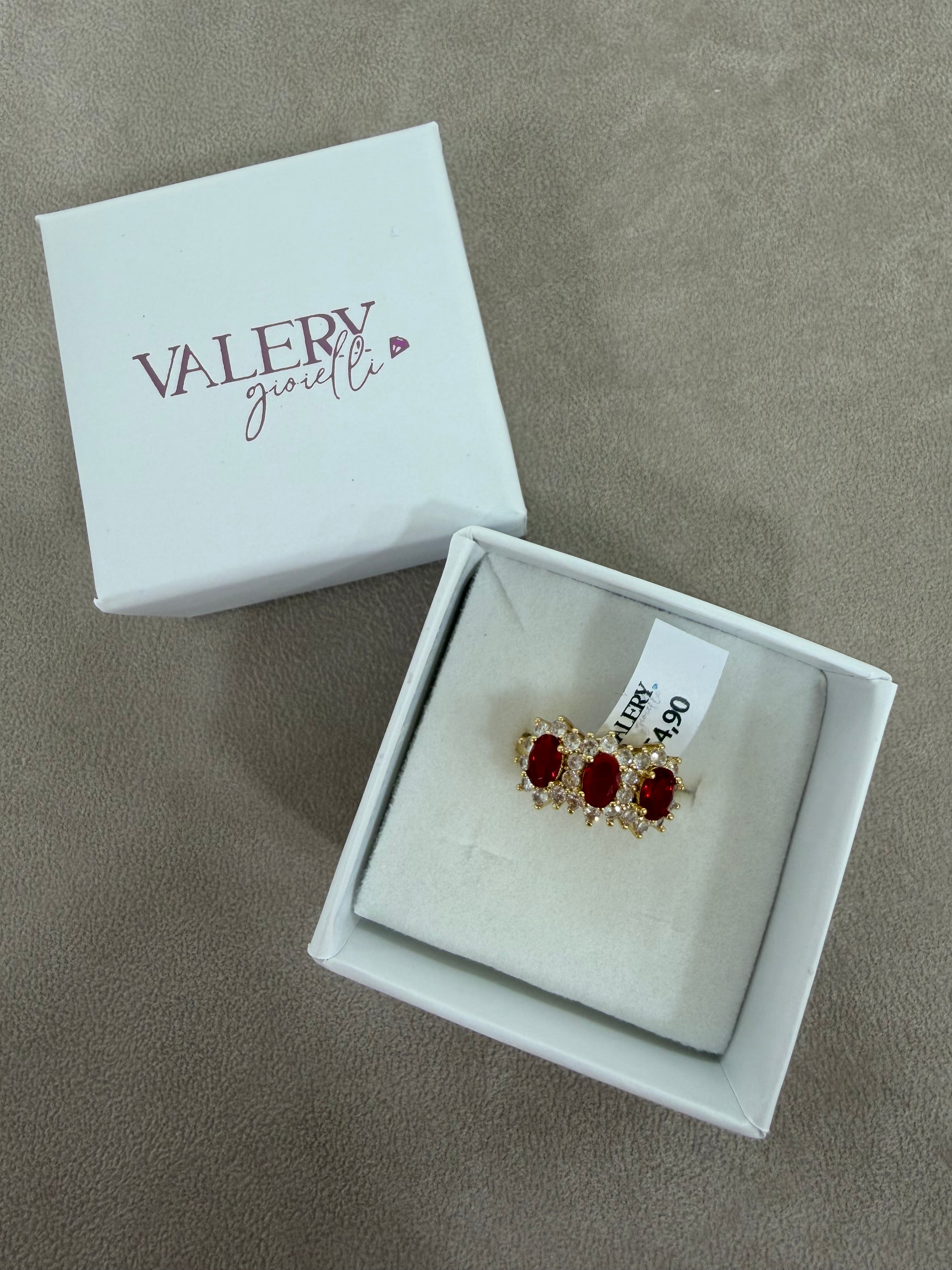 Anello Trilogy in Acciaio Gold  con Zirconi Rubino